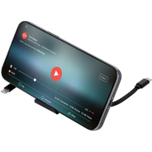 A phone displaying a video, connected to a charging cable set. The product includes a variety of cables for charging various devices.