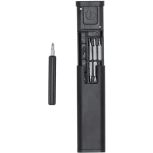 A black tool set containing various screwdrivers, housed in a sleek case with a removable outer cover.