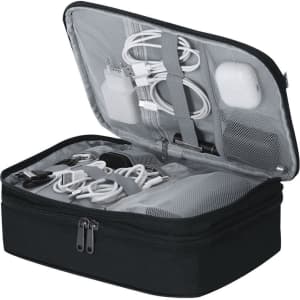 A black organiser case opened to reveal various cables, chargers, and a pair of earbuds inside mesh compartments.