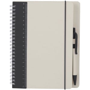 A beige spiral-bound notebook with a ruler on the cover and a black elastic band, accompanied by a pen.