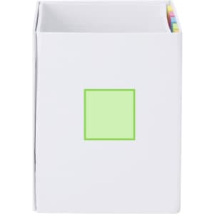 A white notepad pencil holder with a green square on the front and colourful tabs along the top.