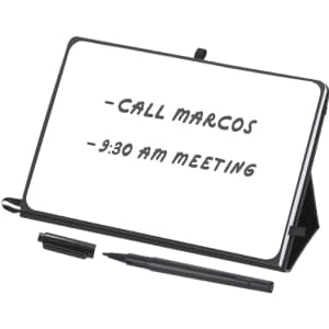 A white notepad whiteboard with a black stand and marker, featuring handwritten notes.