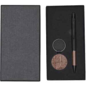 A stylish black gift box containing a metal pen and a wooden accent piece. Features a logo on the pen.
