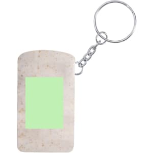 A white keyring with a rectangular shape and a green section, attached to a silver chain link.
