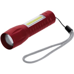 A red torch with a textured grip and a wrist strap, featuring a clear light panel on the side.