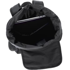 A black backpack with a spacious interior, featuring a compartment for a laptop and a logo.