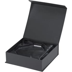 A clear Xinobar plaque displayed in a black presentation box with a satin lining.