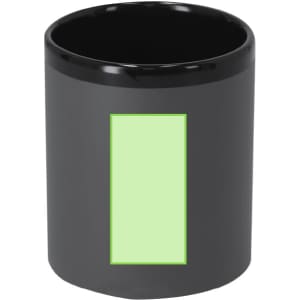 A black coffee mug featuring a green rectangular area and a logo. Suitable for various hot beverages.