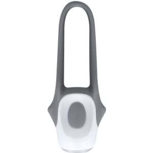 A grey and white bike safety light with a sleek, modern design and a handle for easy attachment.