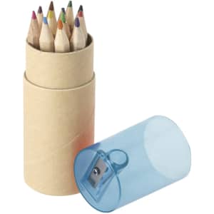 A cylindrical container holds a set of coloured pencils in various shades, with a transparent blue sharpener beside it.