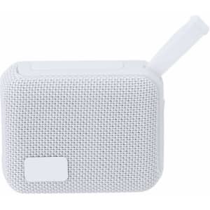 A white Groxen Speaker with a textured fabric surface and a retractable handle on the side. It features a logo.