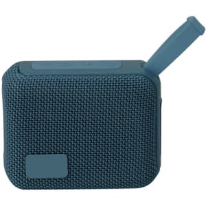 A blue Groxen Speaker with a textured fabric surface and a carrying handle. It features buttons on the top.