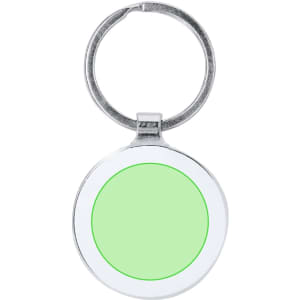 A keyring with a circular silver frame and a light green centre. It has a keychain attachment.