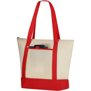 A spacious cooler bag in beige with red straps, featuring a front pocket and a zip closure. It has branding on it.