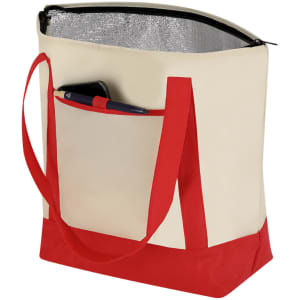 A cream cooler bag with red straps and base, featuring an external pocket for a phone and pen.