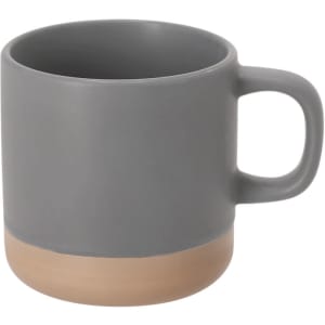 A coffee mug with a grey upper body and a beige base, featuring a handle and a simple, modern design.