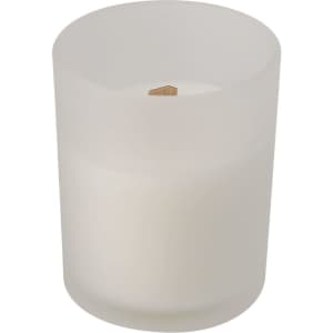 A white aromatic candle in a frosted glass holder with a wooden wick. The candle has a simplistic, elegant design.