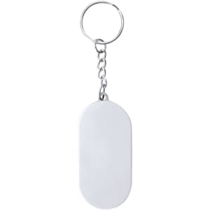 A keychain with a silver metal ring and a smooth, oval white tag attached.