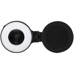 A black and white ring light with a compact design, featuring a hinge for easy storage.