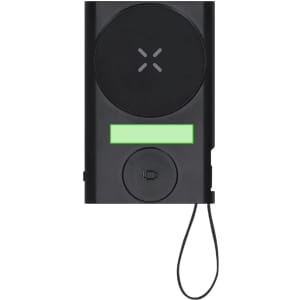 A black power bank with a circular charging pad, a small button, and a green display area. Features a branding logo.