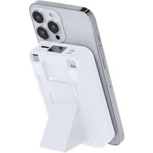 A white power bank attached to a smartphone, featuring a foldable stand at the back. It has a logo on the surface.