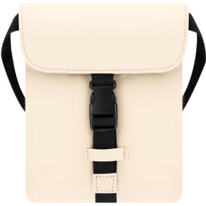 A cream-coloured shoulder bag with a flap and a black buckle, featuring adjustable straps.