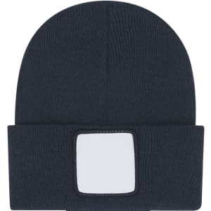 A navy beanie hat featuring a rectangular patch for logo placement. The fabric is ribbed and stretchy.