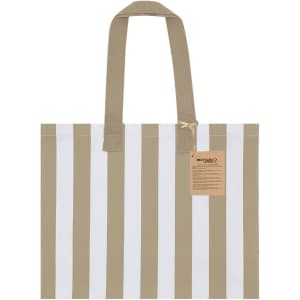 A tote bag with alternating white and beige vertical stripes, featuring sturdy handles and a tag.