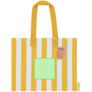 A tote bag with yellow and white stripes, featuring a square green patch and a logo on the side.