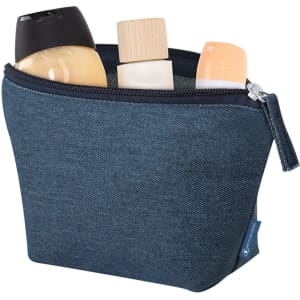 A denim toiletry bag containing various bottles, including a black capped bottle and two other containers. It has a logo.