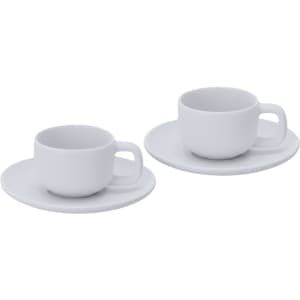 A set of two white coffee mugs with matching saucers, featuring a simple and modern design.