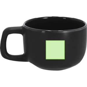 A black coffee mug with a round shape and handle, featuring a green square on its side.