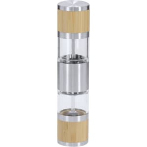 A Tiamat salt and pepper mill in transparent glass with bamboo accents and stainless steel elements. Minimalist design.