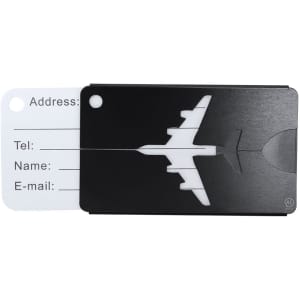 A black luggage tag featuring an aircraft design with a card for personal information.