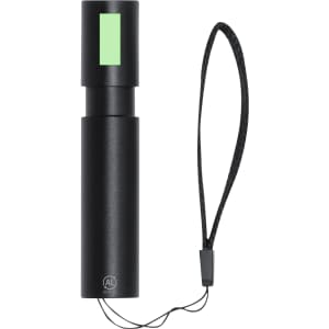 A black torch with a green indicator and a wrist strap, featuring a small logo on the base.