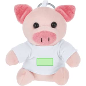 A plush keyring teddy shaped like a pig, featuring pink ears and a white shirt. It has a logo on it.