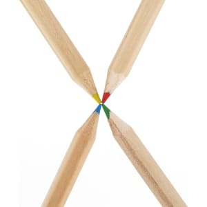 A set of coloured pencils with yellow, red, green, and blue tips, arranged in a star pattern. The pencils have natural wooden bodies.