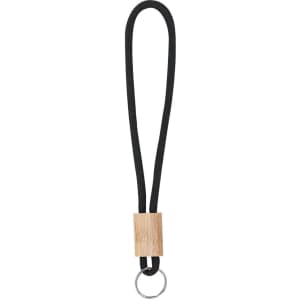 A walnut keyring featuring a wooden block and a black loop, designed for attaching keys.