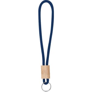 A navy blue keyring with a wooden block and a metal ring. It has a simple, modern design.