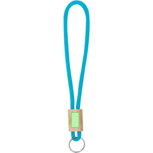 A blue keyring with a wooden accent and an attached metal keyring. Features a smooth, minimalist design.