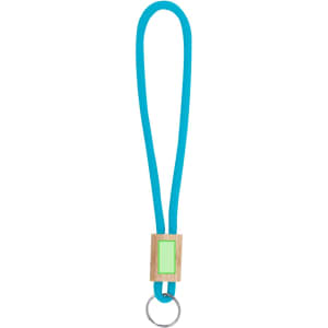 A blue keyring featuring a wooden block with a green panel and a metal ring at the end.