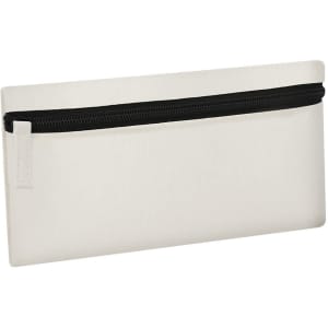 A toiletry bag in cream with a black zipper, featuring a simple design and a small tag on the side.