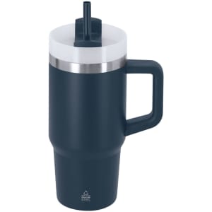 A travel mug in dark navy blue with a stainless steel band and a straw lid. It features a handle and a logo.