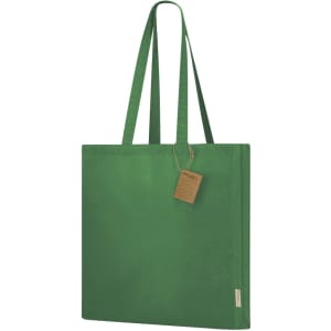 A green tote bag with two handles and a tag, featuring a simple, solid design.
