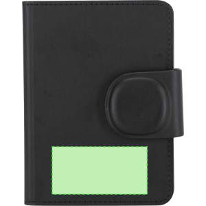 A black passport holder with a textured surface and a closure flap. It features a clear pocket on the front.