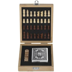 A wooden game set featuring chess pieces, dice, and a deck of playing cards in a stylish box.