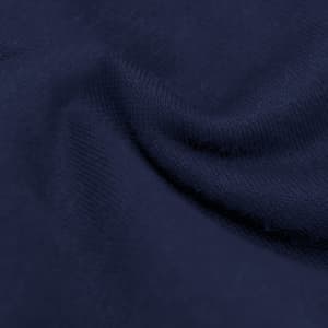 A close-up view of dark navy fabric, showcasing its soft texture and subtle stretch. The material appears smooth and warm.