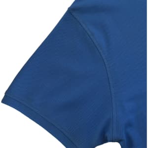 A blue polo shirt featuring a short sleeve design and a logo. Fabric appears smooth and breathable.