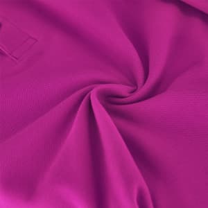 A vibrant pink polo shirt made from textured fabric with a collar and a logo.