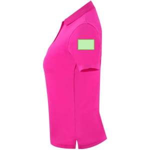 A pink women's polo shirt featuring a sleeve logo area. Short sleeves and a classic collar design.